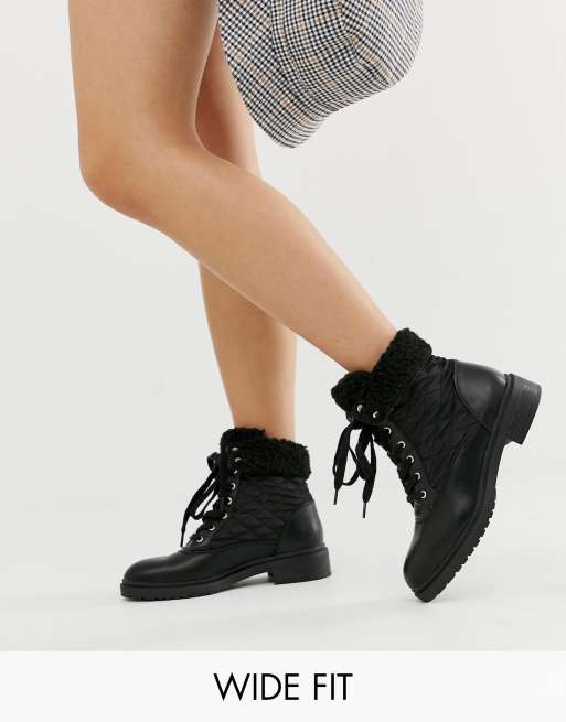 Botas planas best sale con borreguito