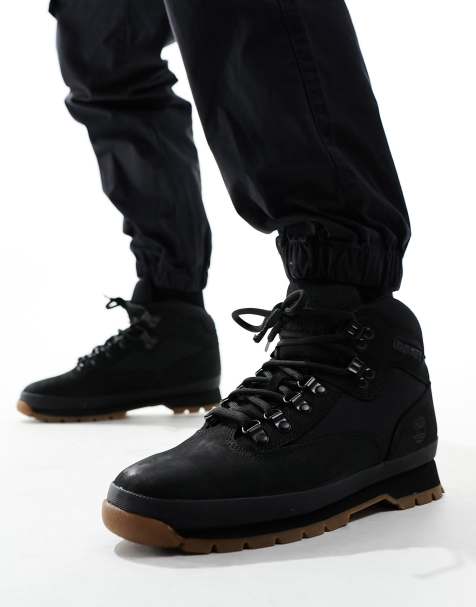 Botas largas discount negras para hombre