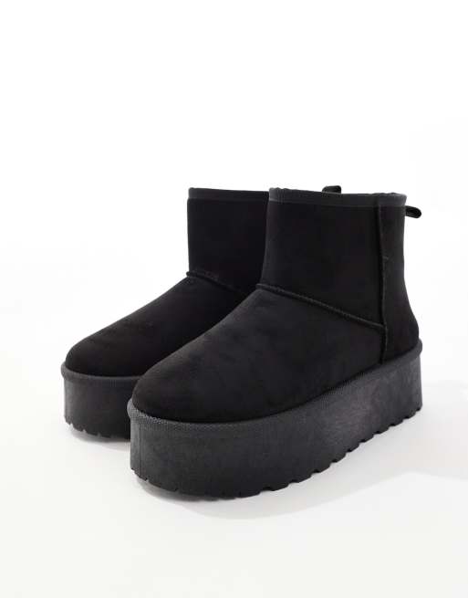 Botas negras con plataforma plana de SEQWL, 2 de 4