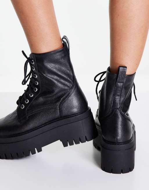 Botas negras con plataforma plana y de cuero Cedar de ASRA ASOS