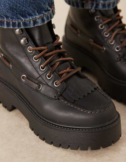 Botas negras con plataforma y pares de ojales de cuero Stone