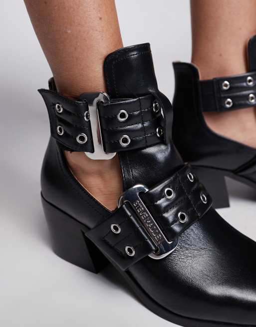 Botas negras con puntera en punta y diseño de aberturas y hebillas de cuero Gustine de Steve Madden , 3 de 4
