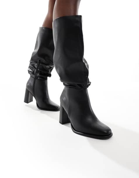 Botas negras con tacón grueso y caña flexible Maggie de London Rebel Wide Fit - view 1