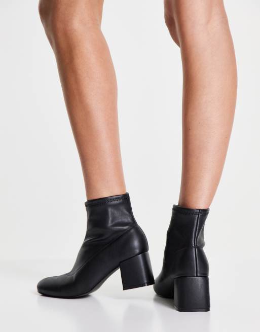 Botas negras de estilo calcetín con tacón de cuero sintético de New Look, 3 de 4