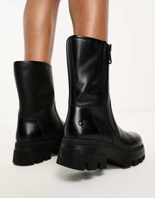 Botas negras de estilo militar con cremallera y suela gruesa de