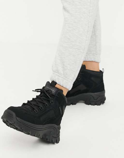 Feudal Relacionado jurado Botas negras de montaña con suela plana Street Blox de Skechers | ASOS