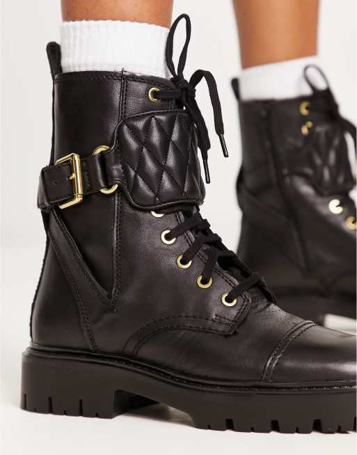 Botas negras estilo biker con detalle de hebilla de Mango ASOS