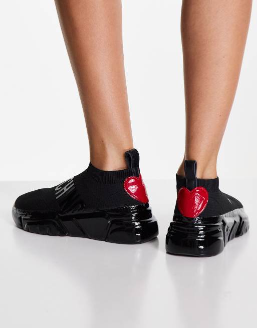 Botas negras estilo calcetín con logo de Love Moschino