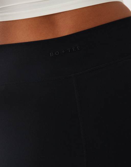 Bo+Tee cross over waistband flare leggings in black, 4 of 5