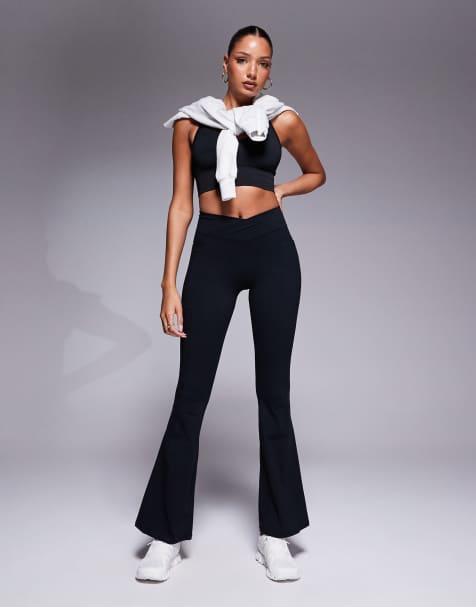 Bo+Tee cross waistband flare leggings in black - view 1
