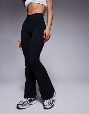 Shop Bo+tee Petite Cross Waistband Flare Leggings
