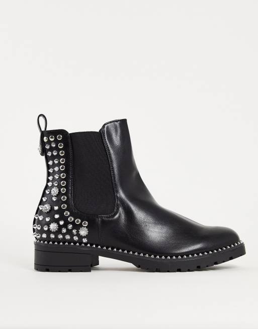 Botines Chelsea con detalle de herrajes en negro de Truffle Collection
