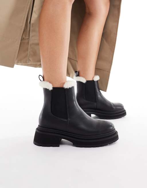Botines Chelsea negros con suela gruesa y forro de tejido estilo peluche Emma de London Rebel