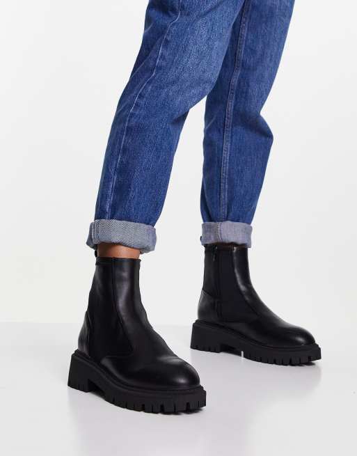 Botines negros sin aberturas con plataforma gruesa de London |