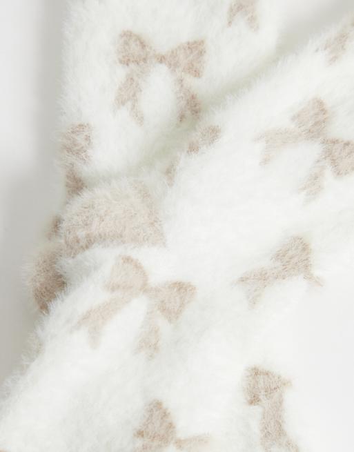 Boux Avenue fluffy socks in neutral bow print, 2 of 3