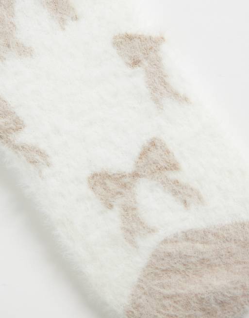 Boux Avenue fluffy socks in neutral bow print, 3 of 3