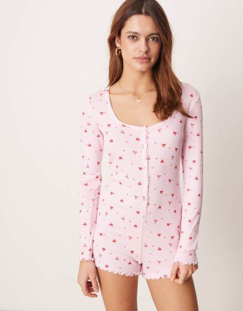 Boux Avenue – Krótki prążkowany różowy kombinezon we wzór w kokardki - view 1