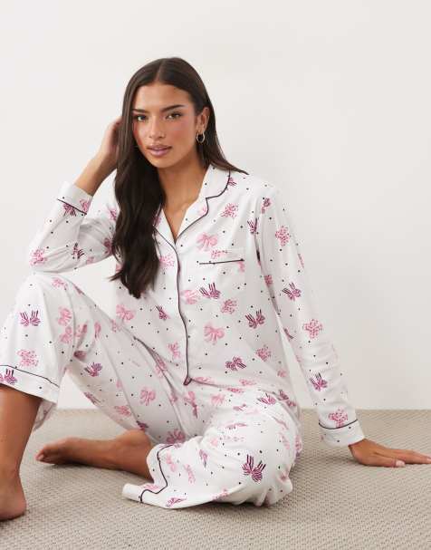 Boux Avenue long sleeve revere shirt and pant PJ set in a bag in white bow and spot print - view 1