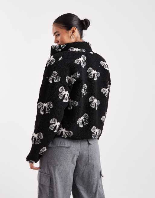 Brave Soul bow print full zip fleece in black and cream, 3 of 4