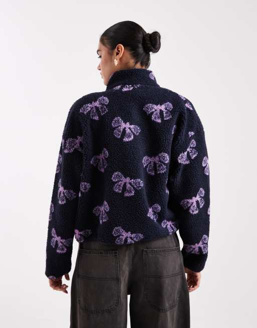 Brave Soul bow print full zip fleece in navy and purple