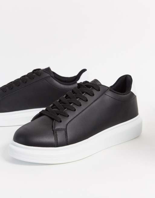 Black with white store sole trainers