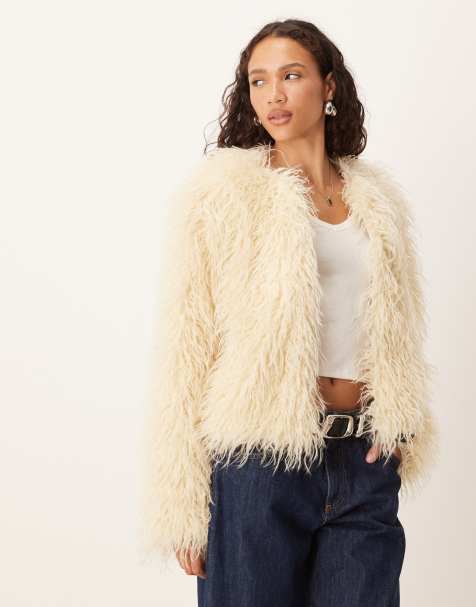 Brave Soul collarless short mongolian faux fur jacket in cream - view 1