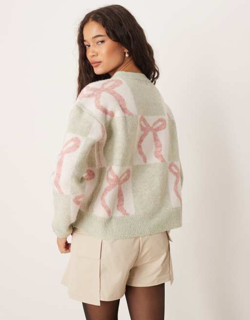 Brave Soul crew neck christmas jumper wtith bow print in sage green, 3 of 4
