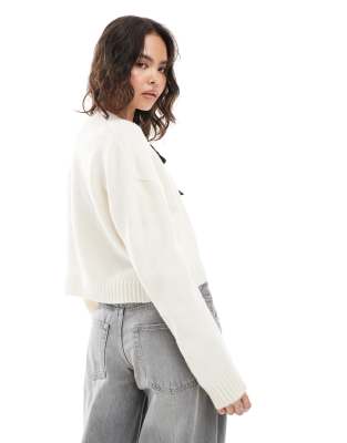 Brave Soul cropped cardigan with black ribbon ties in cream | ASOS