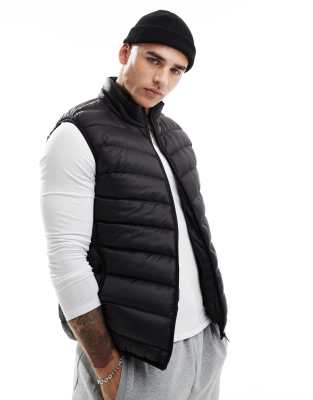 lightweight funnel neck vest in black