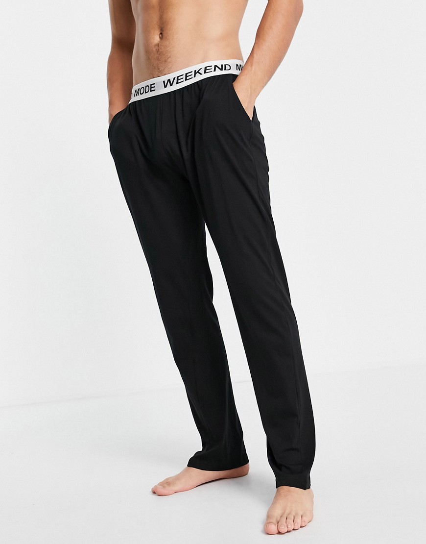 Brave Soul lounge pants with slogan waistband in black