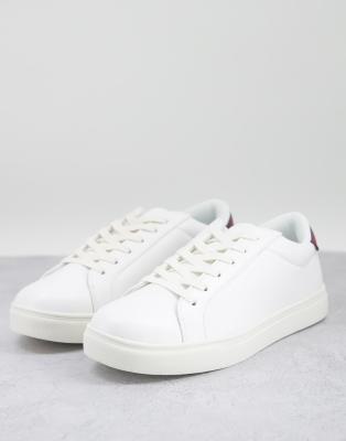 white trainers with black back