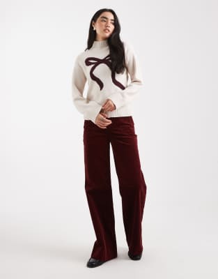 Brave Soul Mock Neck Sweater With Bow Print In Animal Print