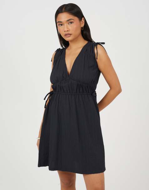 Brave Soul - Mouwloze midi jurk met V-hals en strikdetails in zwart - view 1