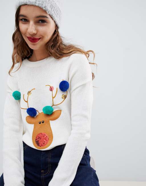 Jumper with shop pom poms