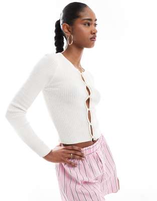 ribbed knit button down cardigan in cream-White