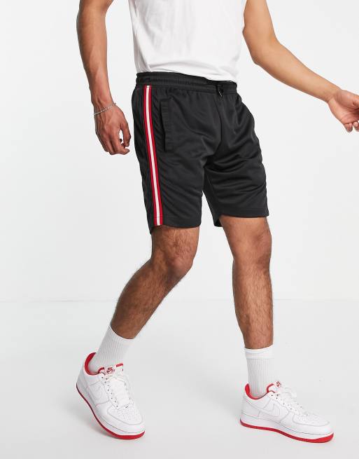 Red and store black striped shorts