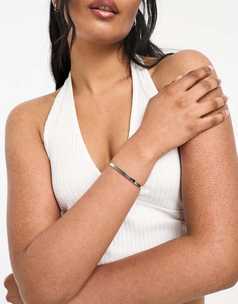 Pulseras Pulseras plateadas, doradas y con charms ASOS