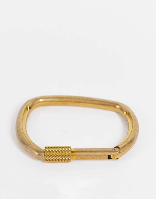 Brazalete dorado antiguo con cierre de bisagra de Calvin Klein