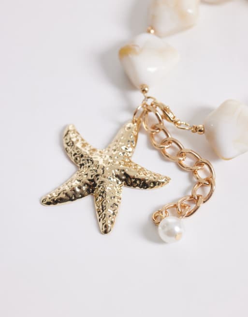 Brazalete dorado con diseño de estrella de mar y piedra de South Beach, 2 de 3