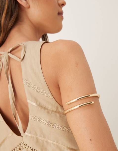Brazalete dorado con diseño envolvente de ASOS DESIGN - view 1