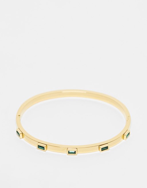 Brazalete dorado de acero inoxidable con cristal baguette verde de ASOS DESIGN