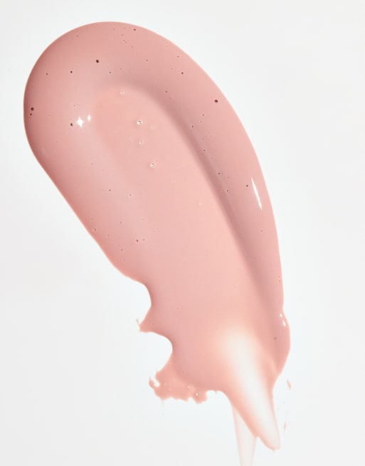 Brillo de labios voluminizador Pout Bomb de Revolution: Tono Candy Pink Nude, 2 de 4
