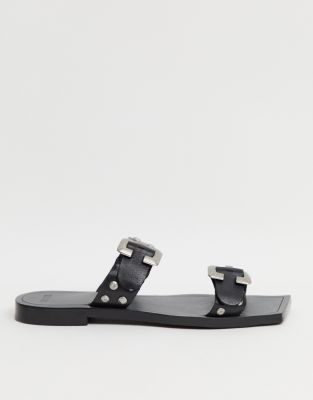 black mules with buckle