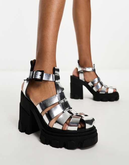 Bronx – Furrow – Absatz-Sandalen mit Riemchen in Gitter-Optik und Metallic-Silber