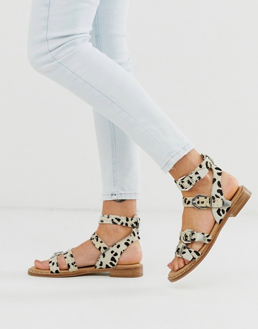 Bronx leather western buckle sandals in dalmation print