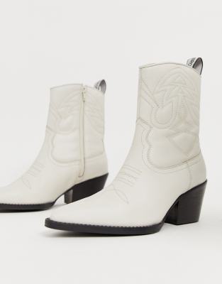 cowboy boots with white stitching