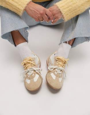  Park-err leather trainers with contrast laces in butter yellow