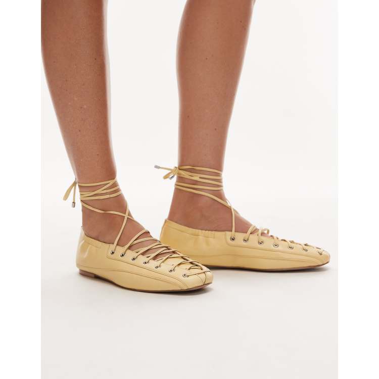 Bronx Ser-ajaa lace-up detail ballet flats in leather butter