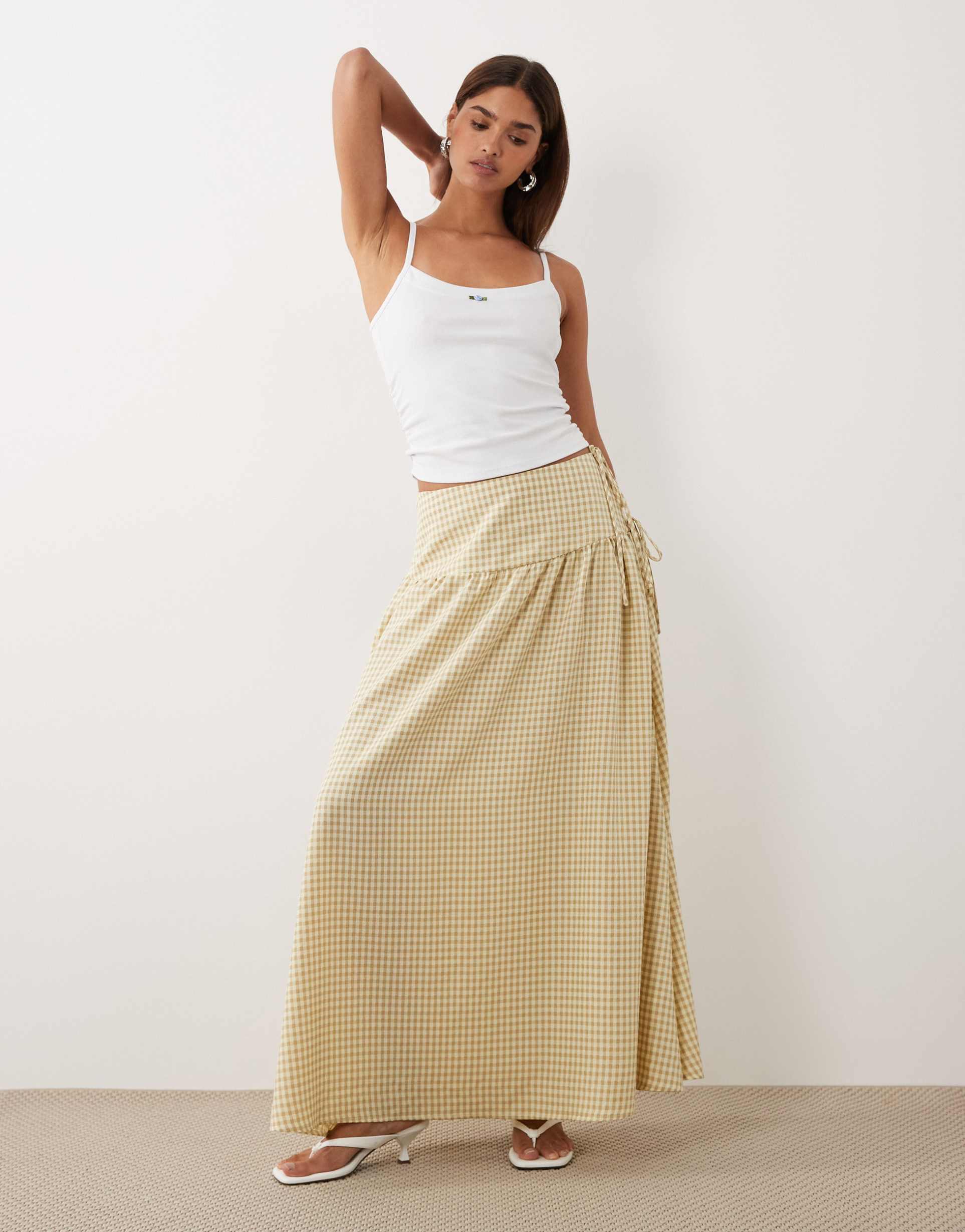 bronze snake rylan gingham maxi skirt in taupe