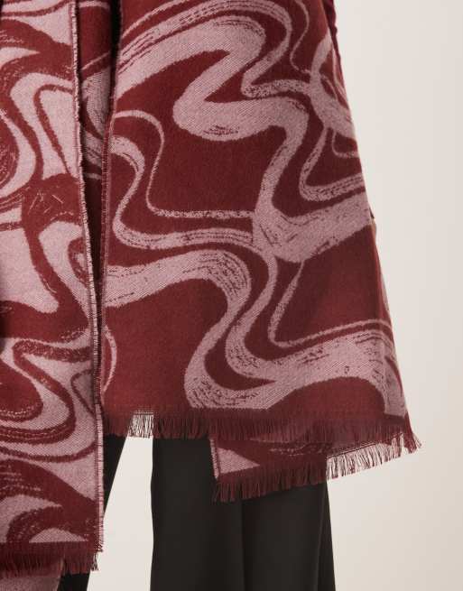 Bufanda rosa y burdeos con patrón de jacquard de formas onduladas de ASOS DESIGN, 2 de 3